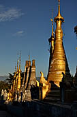 Inle Lake Myanmar. Indein, on the summit of a hill the  Shwe Inn Thein Paya a cluster of hundreds of ancient stupas. Many of them are ruined and overgrown with bushes. 